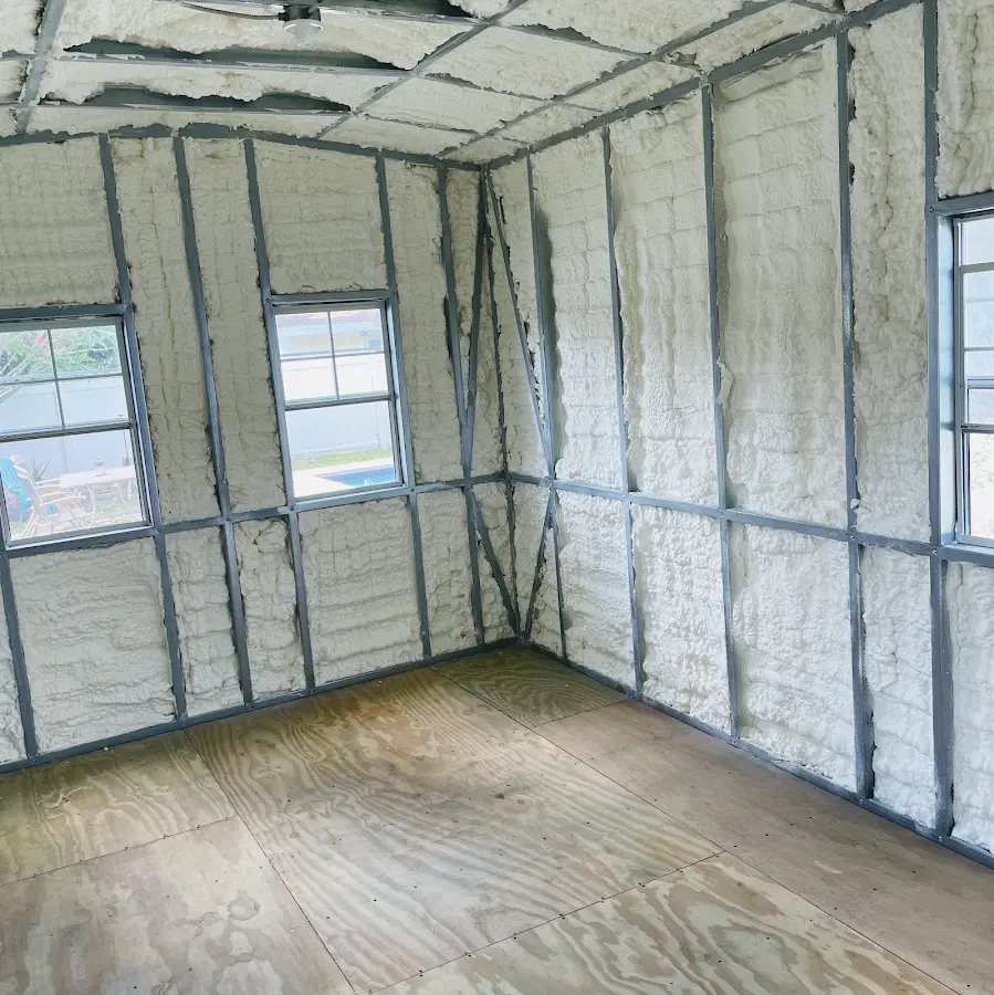 Closed-cell spray foam insulation applied to wall cavities in a residential project in Plattsburgh